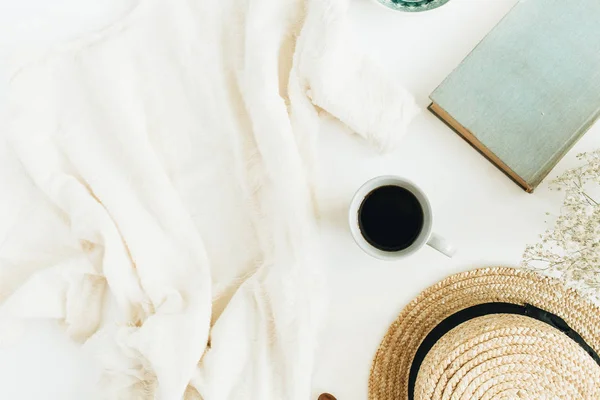 Female Office Desk Coffee Book Straw Hat Flowers Blanket White — Stock Photo, Image