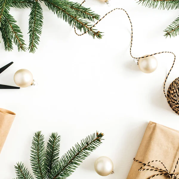 Christmas, New Year gifts packaging. Round frame mock up with holiday composition with decorations and fir branches on white background. Flat lay, top view.