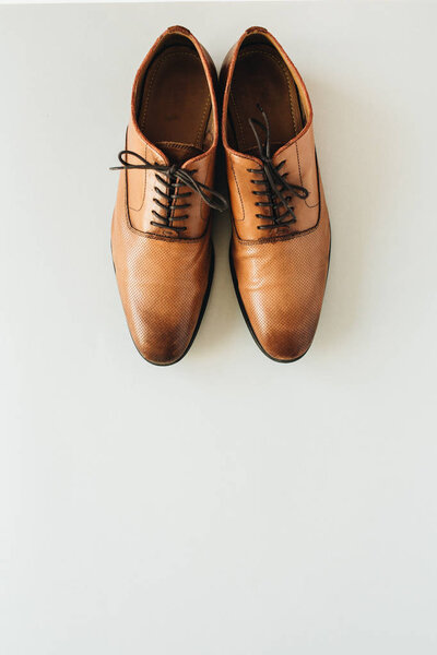 Men's leather shoes. Flat lay, top view fashion background
