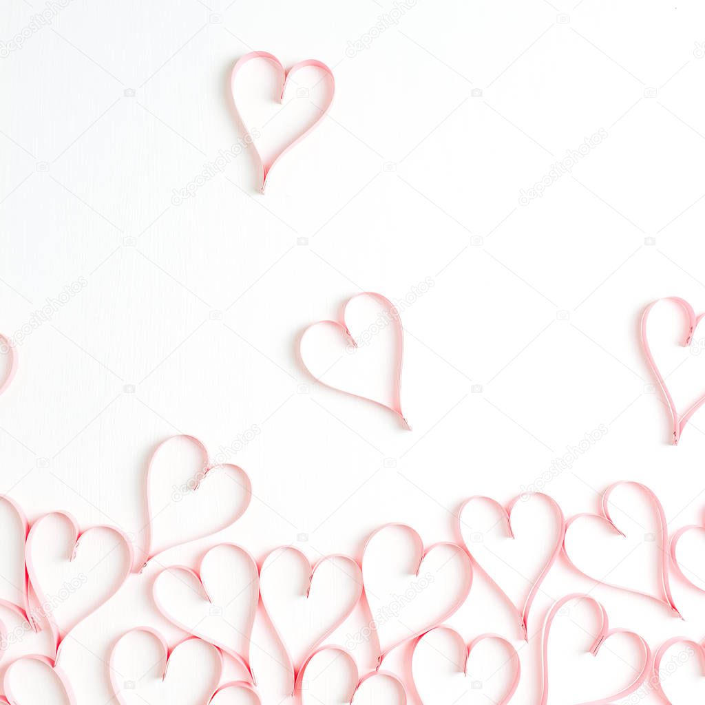 Paper heart symbols on white background. Flat lay, top view Valentines Day background love concept.