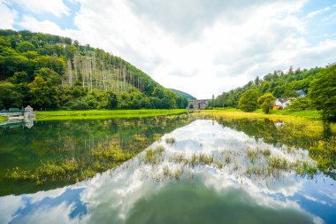 Reservoir on the dam wall at Diemelsee and the surrounding landscape. Nature at the Diemel Dam in the Sauerland.