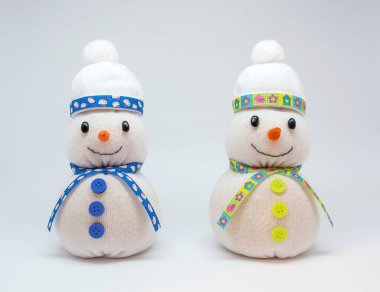 Güzel snowmans tarafsız arka plan üzerinde izole fotoğrafı