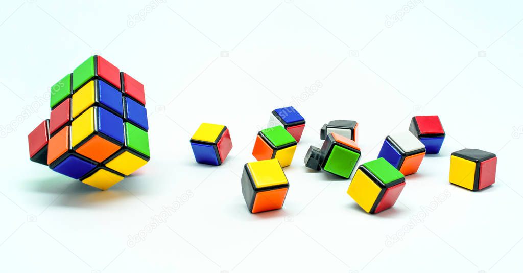 Photo of many small color cubes isolated on white background