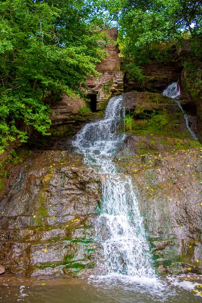 Photo of high waterfall in the mountains — Stock Photo, Image