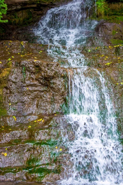 Photo of high waterfall in the mountains — Stock Photo, Image