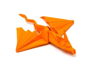 Beyaz arka plan üzerinde izole turuncu origami ejderha fotoğraf