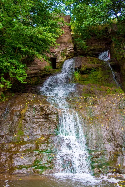 Photo of high waterfall in the mountains — Stock Photo, Image