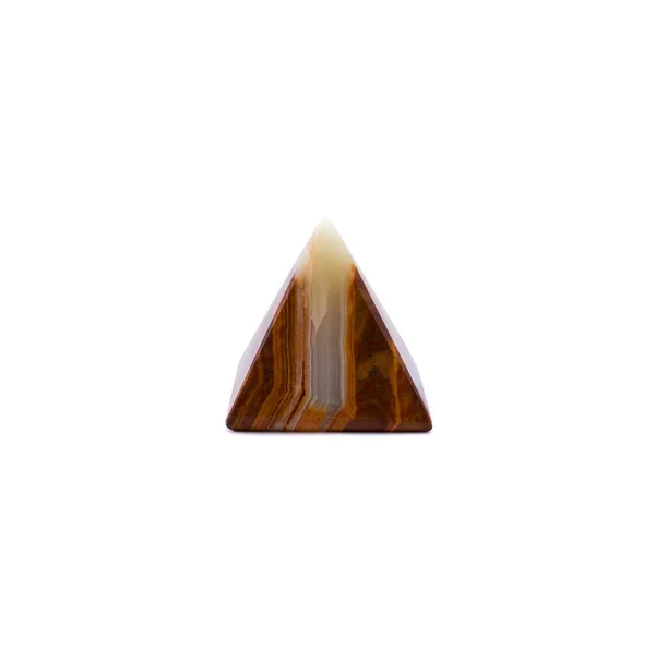 Foto av brun vit onyx pyramid isolerad på en vit bakgrund Royaltyfria Stockfoton