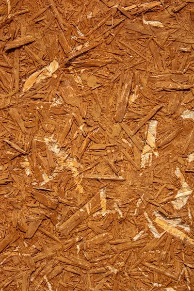 Photo of an old wooden board texture consist of wood sawdust — Stock Photo, Image