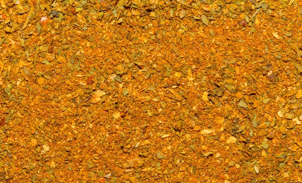 Foto de primer plano textura de especias de naranja para la carne y el pollo y otros alimentos, fondo — Foto de Stock