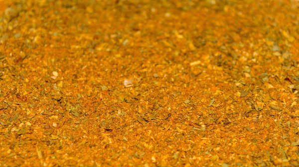 Foto de close up textura de especiarias de laranja para carne e frango e outros alimentos, fundo — Fotografia de Stock