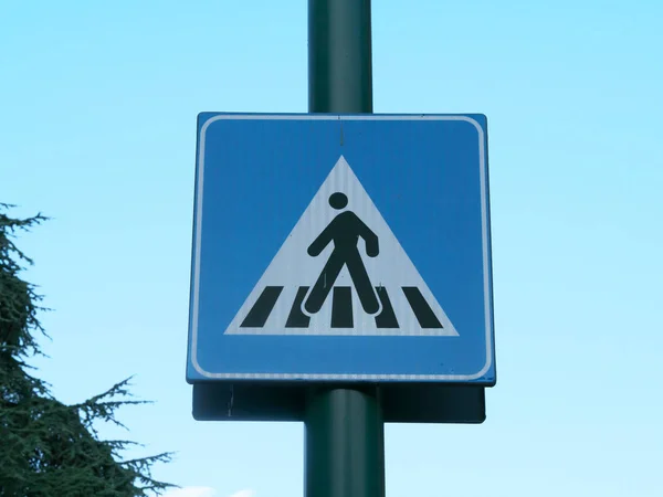 Milan,Italy-July 24, 2018: Road sign of pedestrian crossing, Milan