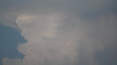 (Live action)An aircraft passes in front of gigantic cumulonimbus around 6:50PM on August 26, 2018 in Tokyo, Japan