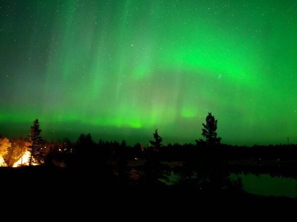 Yellowknife,Canada-August, 2019: Aurora borealis or Northern lights observed in Yellowknife, Canada, on August, 2019