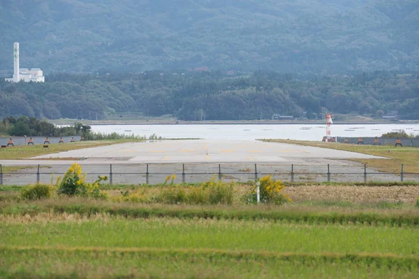 Niigata,Japan-October 22, 2019: Sado airport runway 10 in Sado island, Niigata, Japan. Its operation is indefinitely suspended.