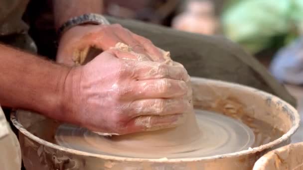Female Potter Craftsman Helps Learner Work Pottery Wheel — Stock Video