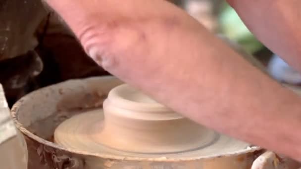 Female Potter Craftsman Helps Learner Work Pottery Wheel — Stock Video