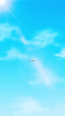 Commercial Airplane Flying High Over Blue Sky