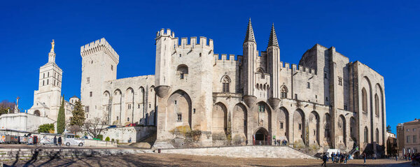 AVIGNON, FRANCE - MARCH, 2018: Panorama of The Papal Palace one of the biggest gothic buildings in Europe at Avignon France