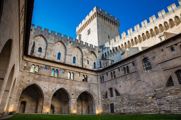AVIGNON, FRANCE - MARCH, 2018: The Papal palace one of the biggest gothic buildings in Europe at Avignon France