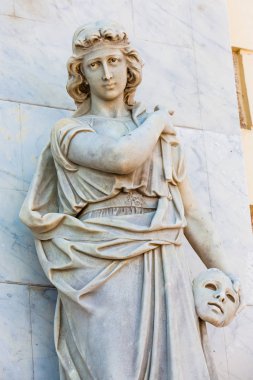 CARTAGENA DE INDIAS, COLOMBIA - AUGUST, 2018: Melpomene muse statue at the facade of the Adolfo Mejia theater in Cartagena de Indias clipart