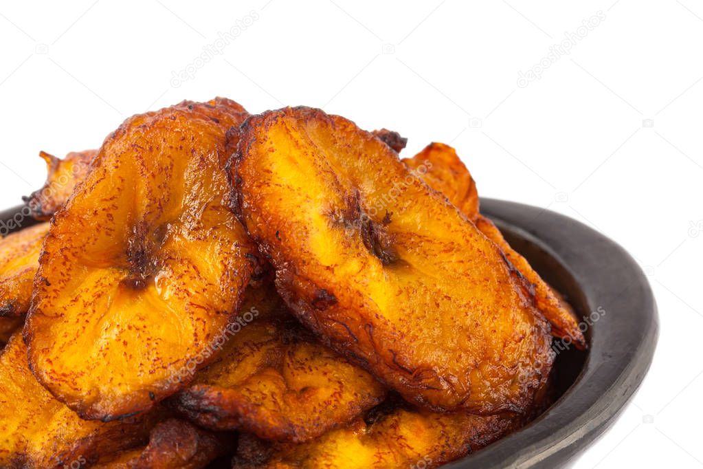 Deep fried ripe plantain slices isolated in white background