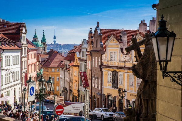 PRAGUE, CZECH REPUBLIC - APRIL, 2018: Beautiful streets of Prague in a sunny day at the beginning of spring