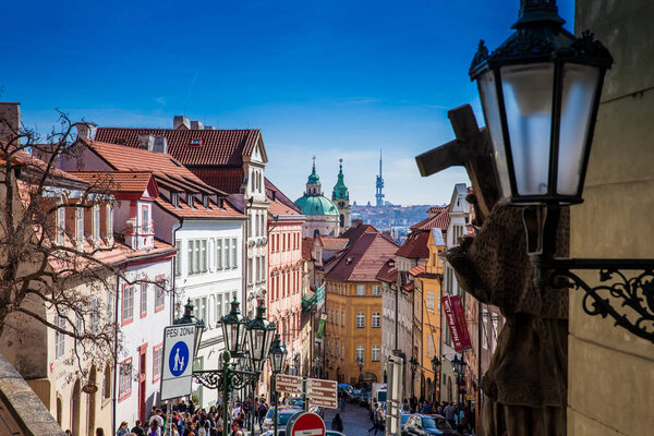 PRAGUE, CZECH REPUBLIC - APRIL, 2018: Beautiful streets of Prague in a sunny day at the beginning of spring