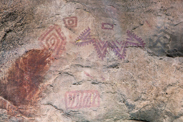 Prehistoric paintings on rock known as petroglyphs in the municipality of Facatativa in Colombia