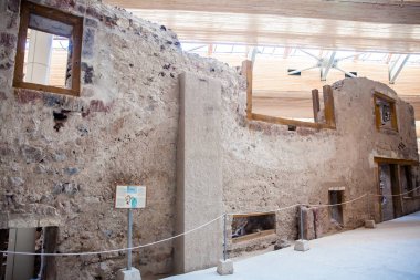 Ancient ruins at Akrotiri archaeological site in the Santorini Island which is believed to have inspired the story told about Atlantis by Plato clipart