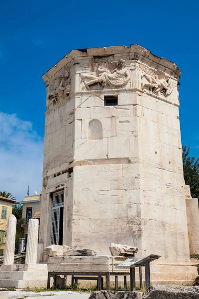 Tower of the Winds or the Horologion of Andronikos Kyrrhestes anTower of the Winds an octagonal Pentelic marble clocktower in the Roman Agora in Athens constructed in the 2nd century BC — Stock Photo, Image