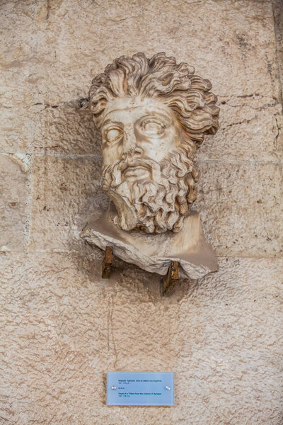 ATHENS, GREECE - APRIL, 2018: Head of a Triton from the Odelon of Agrippa at the Stoa of Attalos in Athens