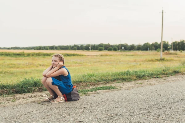 Little Girl Sitting Bag Road Waiting Car — Stock Photo, Image