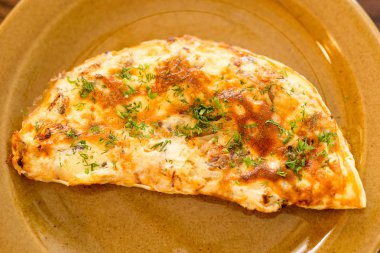 Fırında etli börek, balık, patates, peynir, yeşillik