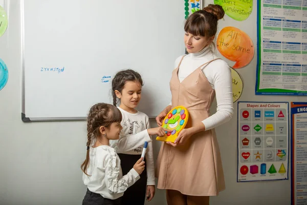 Little Student Meets Blackboard Lesson Teacher Checks Homework — Stock Photo, Image