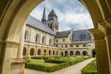 Fontevraud abbey court and gardens in France clipart