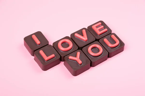 Amo Grabado Chocolate Sobre Fondo Color —  Fotos de Stock