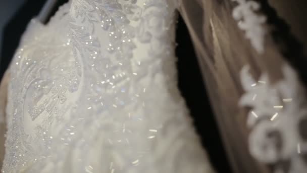 Close-up of wedding dress with sparkles, lace of a wedding dress — Stock Video