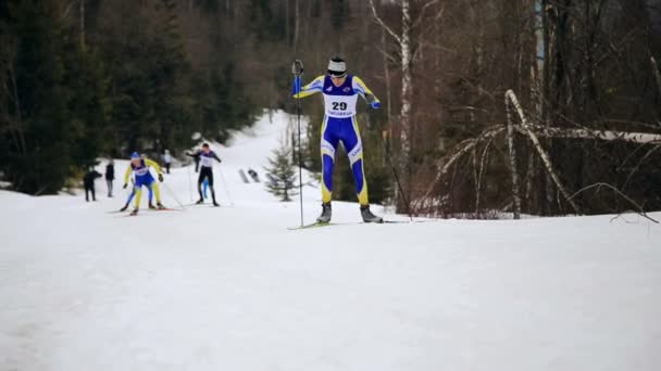 Ukraine. Yavoriv. 12 march 2019. Group of students of girls and boys, takes part in local biathlon competitions — Stock Video