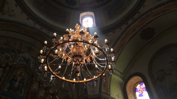 A ray of sun that passes through the Windows of the Church and illuminates the Church. Top view — Stock Video
