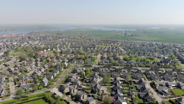 Flying over the town of Grou in Holland, the View from the drone on the city of Grou — Stock Video