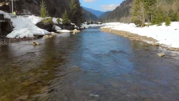 Low flying over the river in the winter mountains. winter carpathian Ukraine — Stock Video