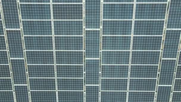 Close up top view on solar panel. Panorama of solar panels from a quadcopter. Background or texture — Stock Video