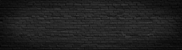 Old black brick wall panorama — Stock Photo, Image