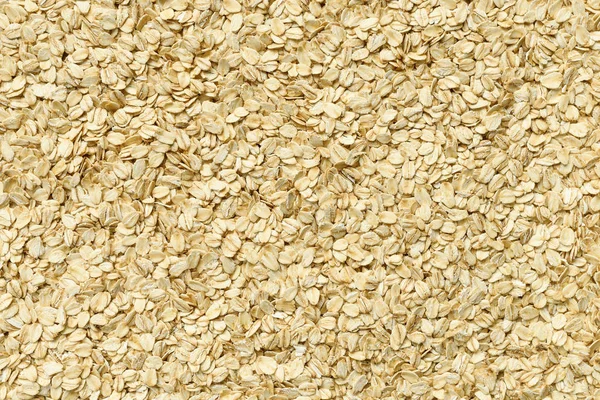 Oat flakes sebagai latar belakang — Stok Foto