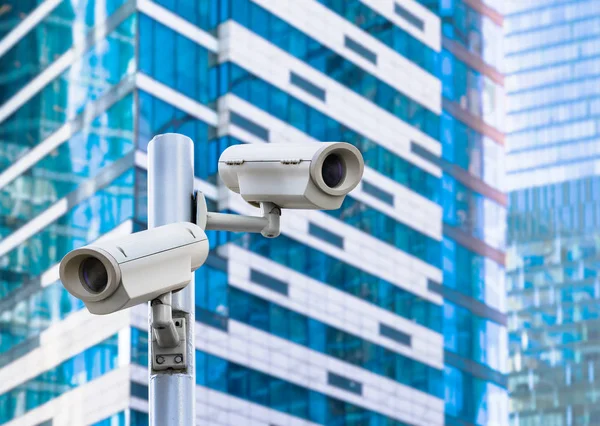 Two CCTV security cameras on street