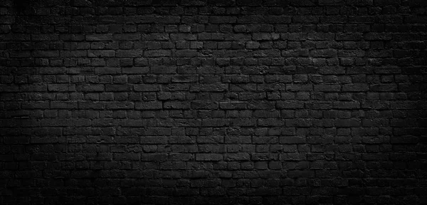 Old black brick wall background. — Stock Photo, Image