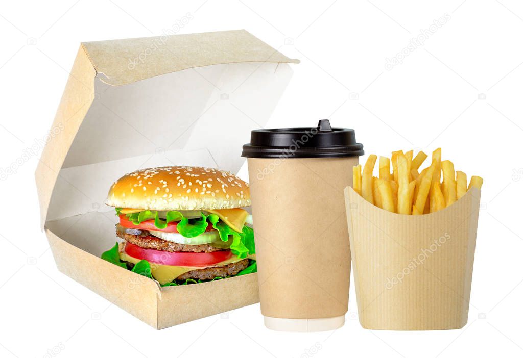 Tasty Hamburger, fries and cofee in cardboard package isolated on a white background