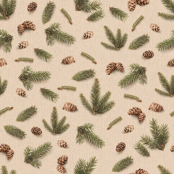 Christmas seamless pattern of Fir branches and pine cones. Winter pattern on kraft paper background. — Stock Photo, Image