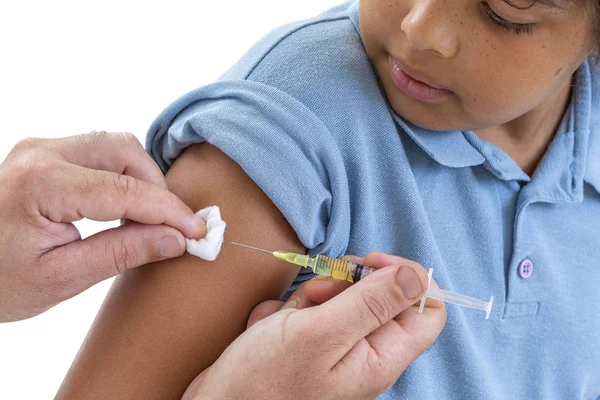 Vaccination. Young boy receiving vaccination immunisation by professional health worker, kid looking on shoulder — Stock Photo, Image